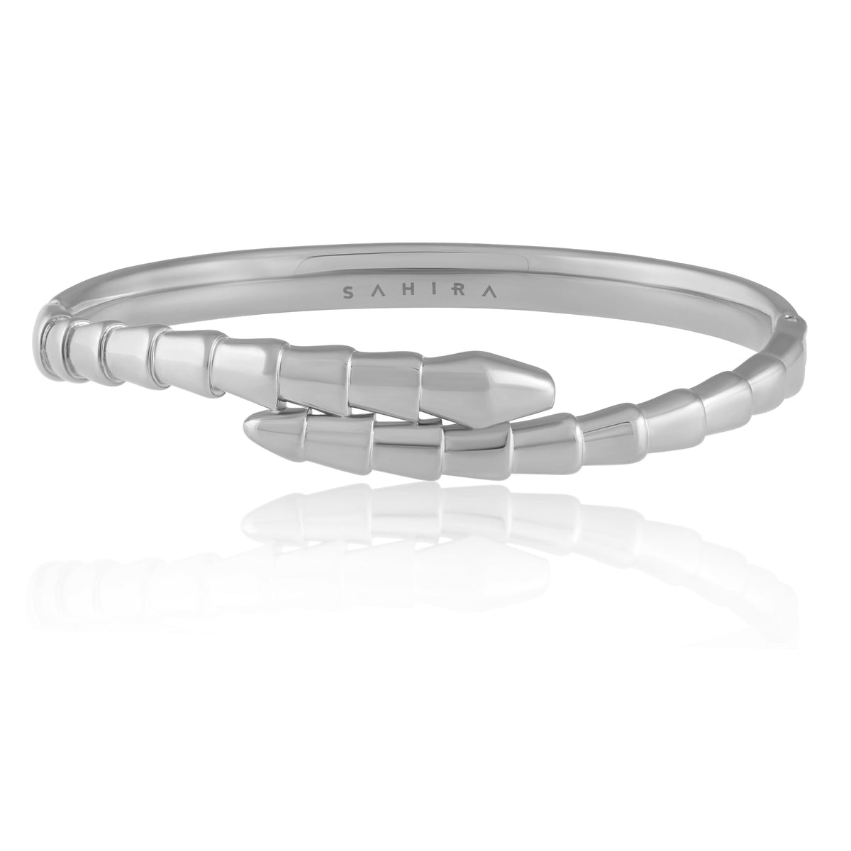 Silver bracelet with bullet design on a white background