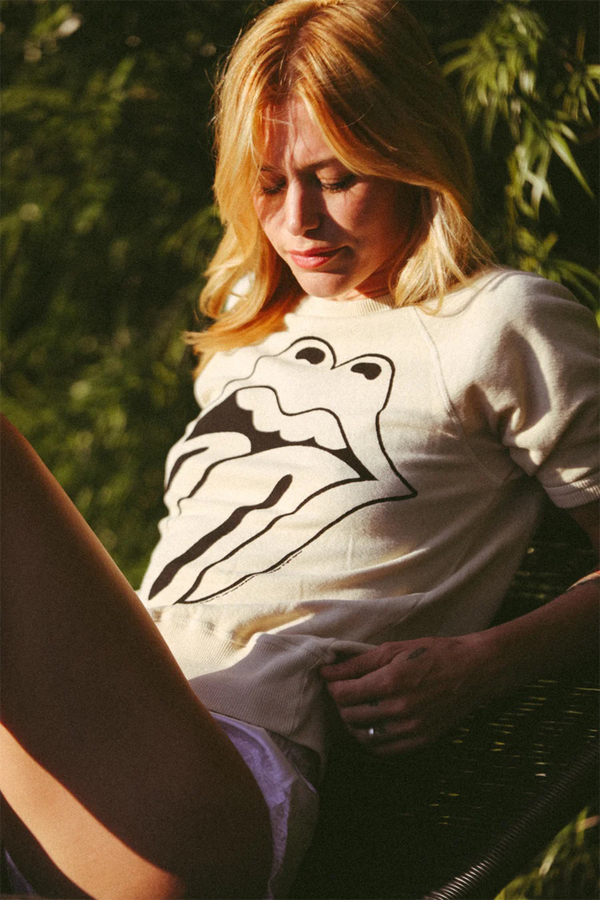 People of Leisure Rolling Stones Ivory Raglan Tee — relaxed 3/4-sleeve raglan graphic tee in ivory combed cotton.