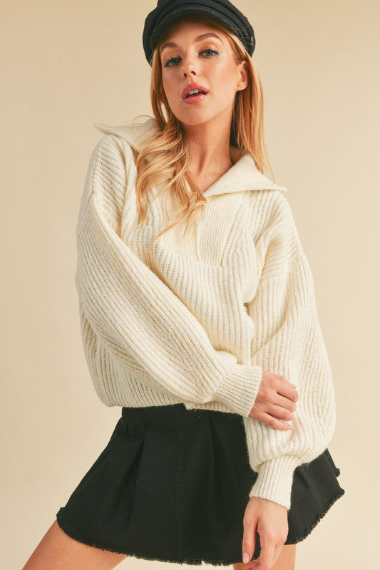 Danae Knit Sweater with henley neckline, balloon sleeves, and loose fit in thick cozy yarn – sporty chic style with pocket detail
