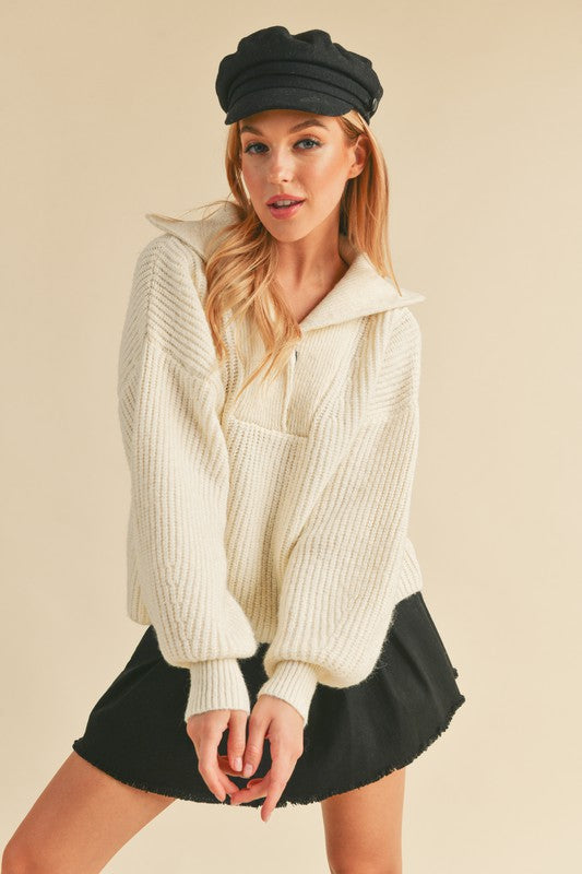Danae Knit Sweater with henley neckline, balloon sleeves, and loose fit in thick cozy yarn – sporty chic style with pocket detail