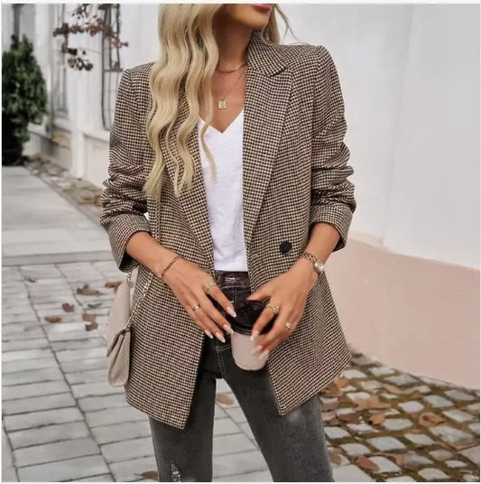 Women wearing lapel buttoned blazer and white v neck and jeans