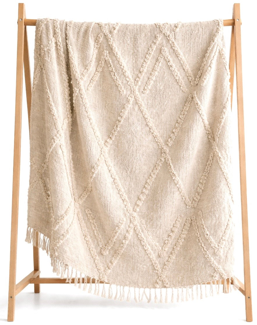 Handmade boho throw blanket with textured diamond pattern and fringe