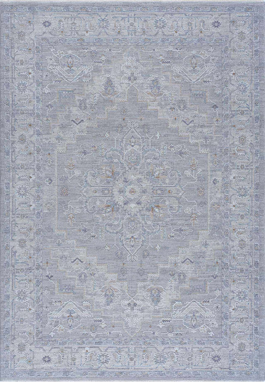 Gray area rug with a subtle pattern on a plain background