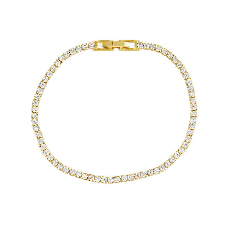 Gold bracelet with clear stones on a white background