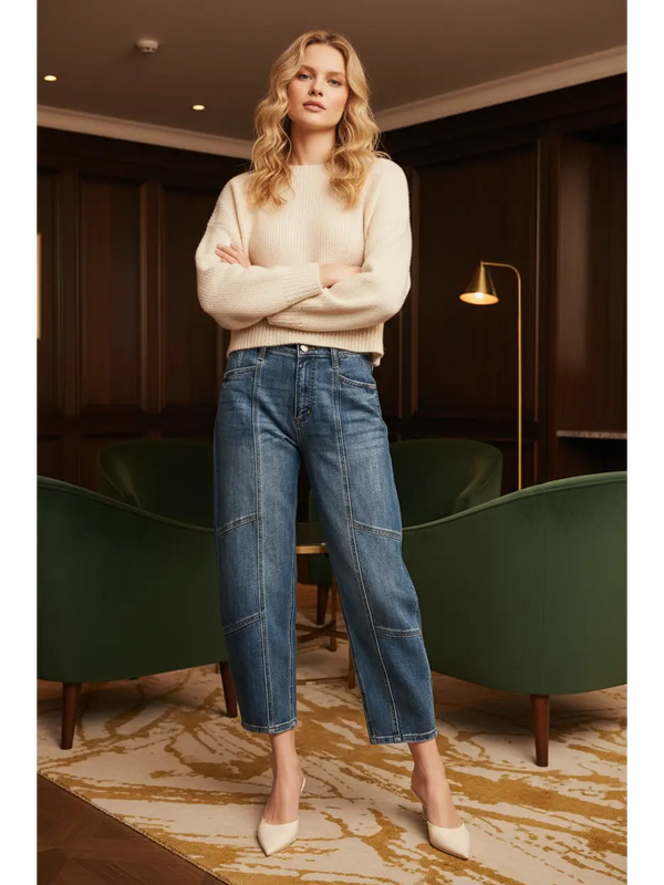 High Rise Relaxed Barrel Jeans in a medium stone wash — tapered barrel-leg denim styled with a cream sweater