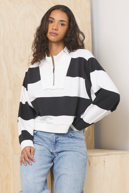 Woman wearing Vintage Havana French Terry Half Zip Pullover for Women with jeans