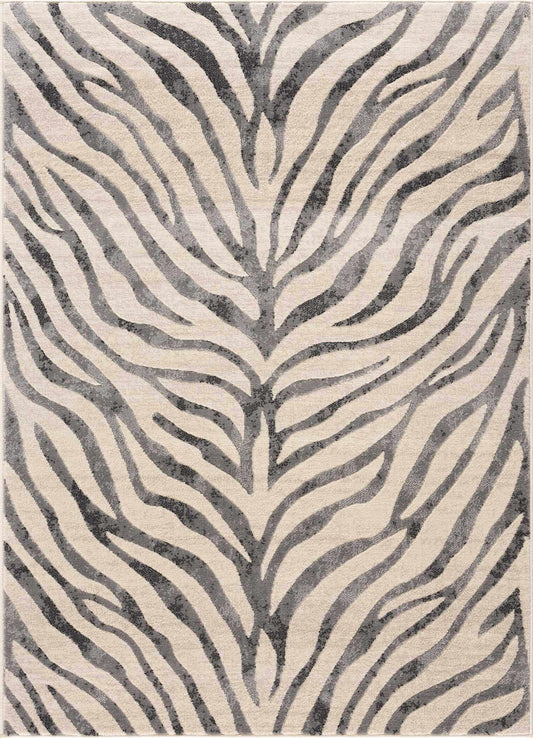 Rug with zebra stripe pattern in beige and gray