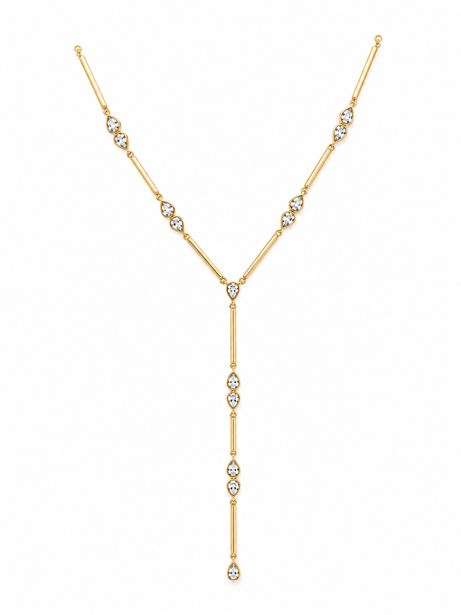 A gold Y-necklace featuring clear marquise-cut gemstones set along the chain and drape, displayed against a solid white background.