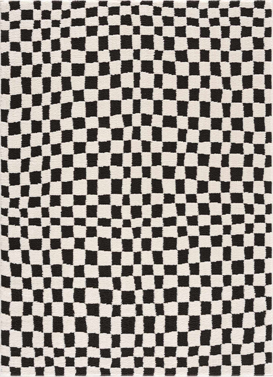 Black and white checkered pattern on a textured surface