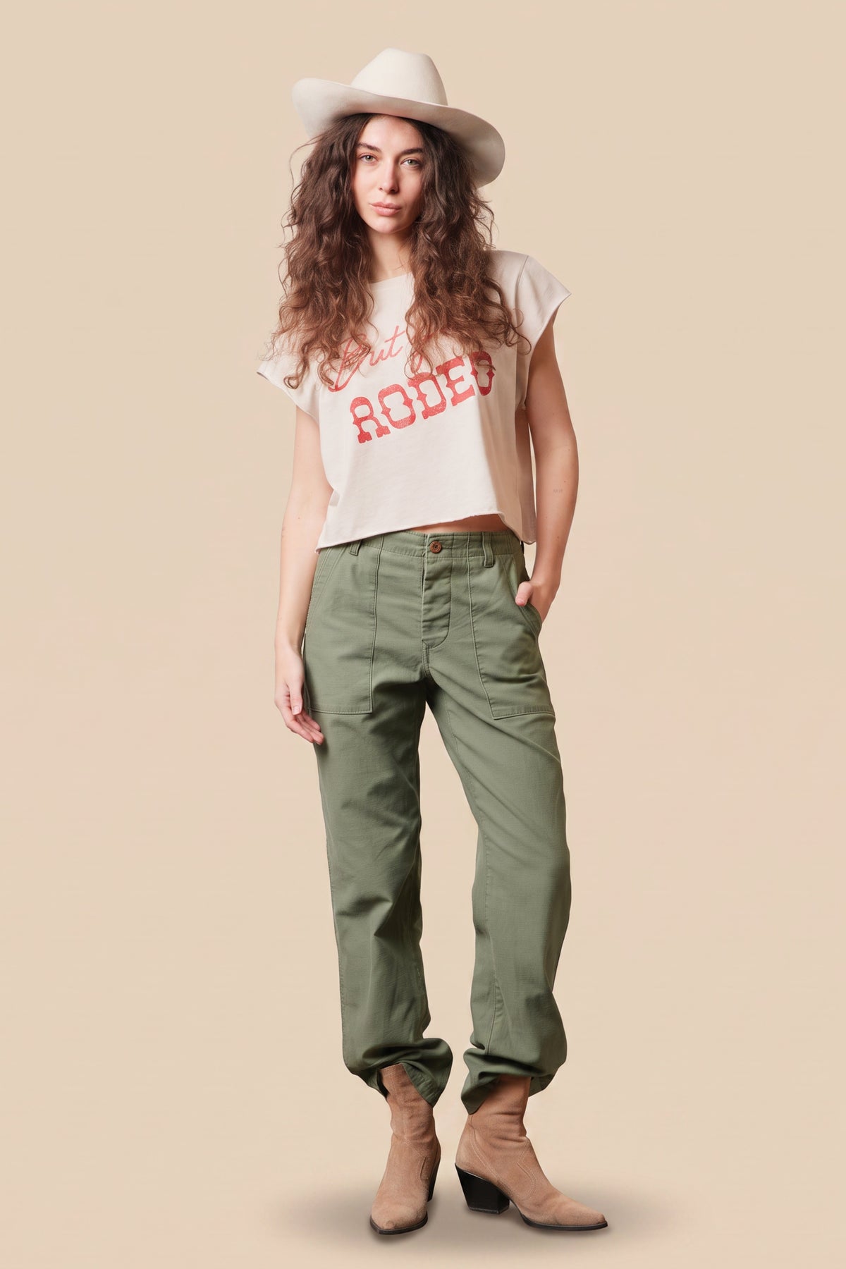 “But First, Rodeo” Crop Top in ecru — western graphic crop top with raw-edge sleeves in organic cotton.