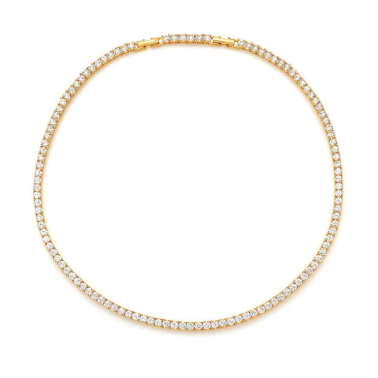 Gold necklace with clear stones on a white background