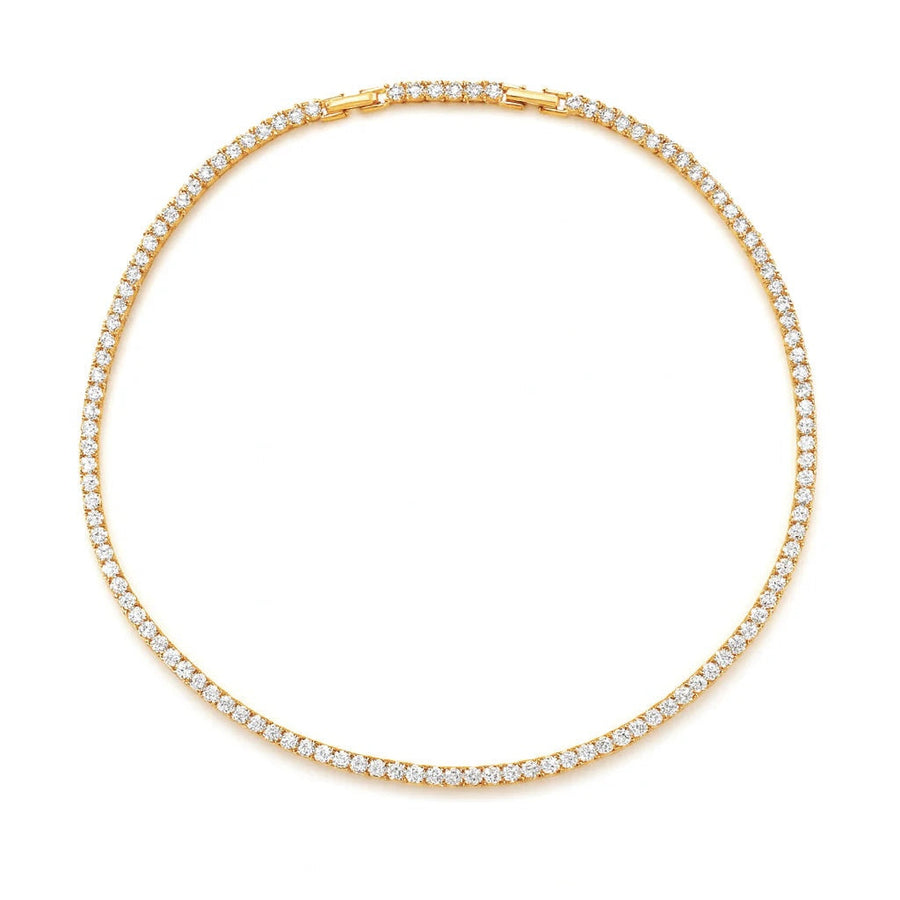 Gold necklace with clear stones on a white background