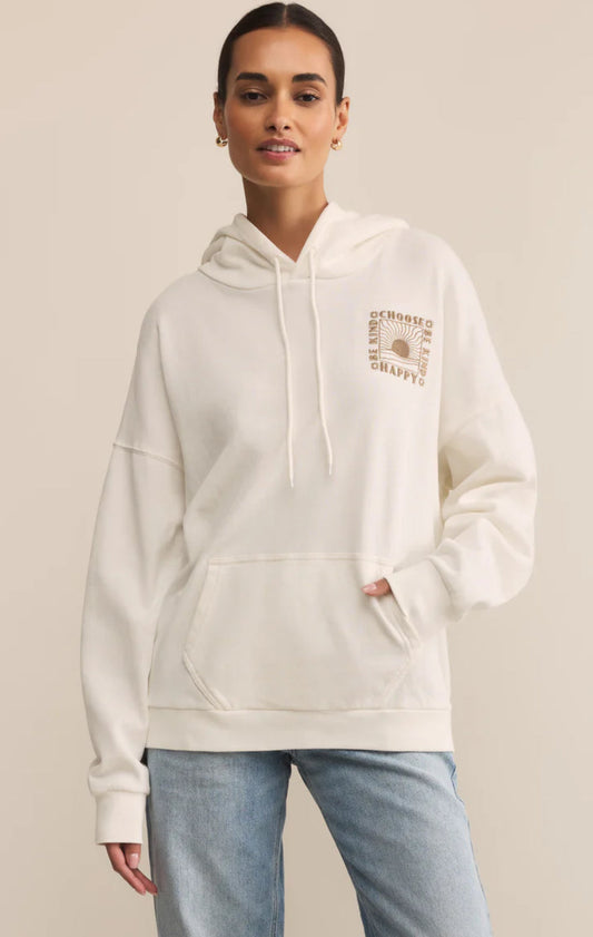 women in an off white sweatshirt with embroidery