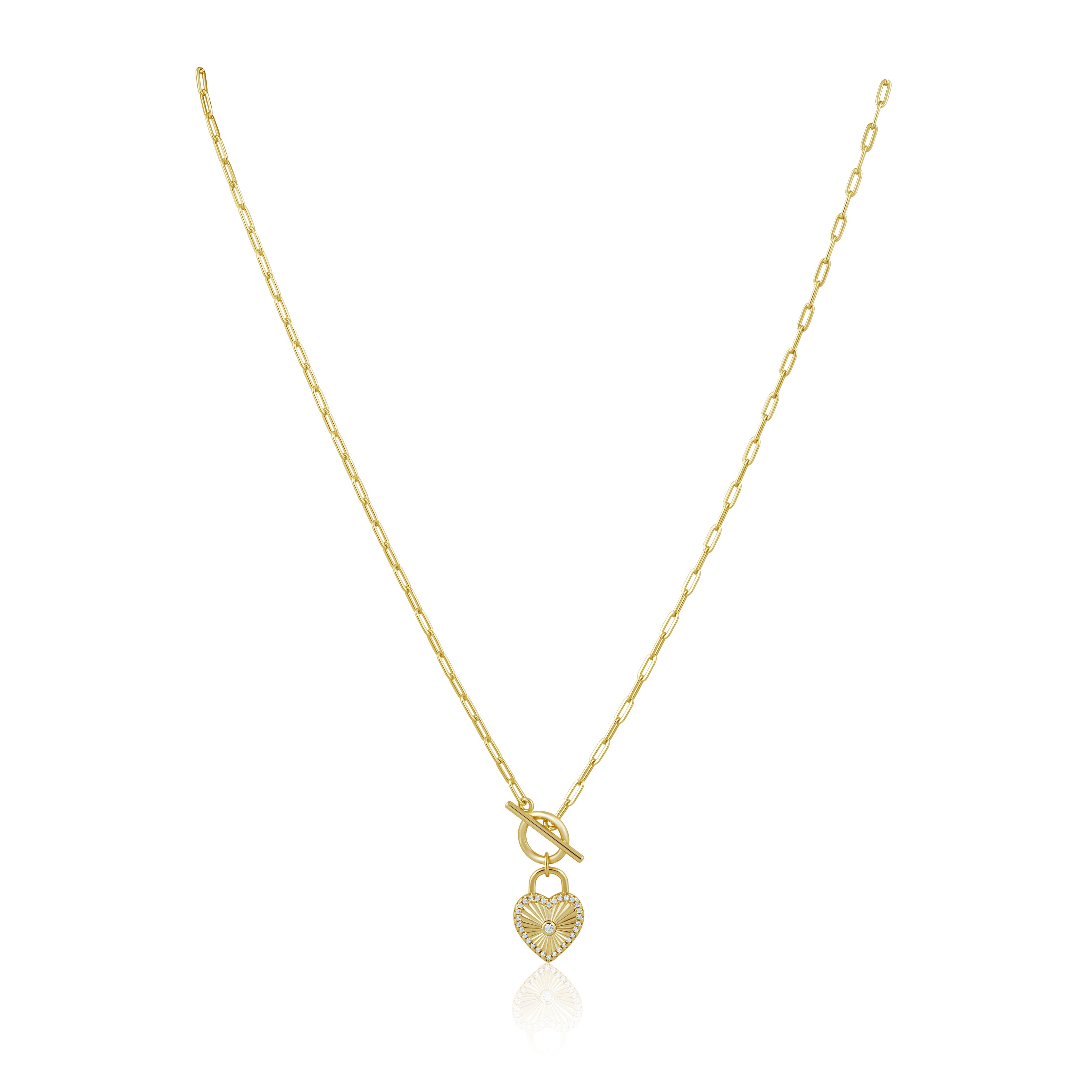 Gold necklace with a heart-shaped pendant on a white background