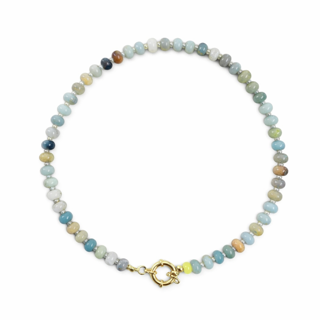Multicolored beaded necklace with a gold clasp on a white background