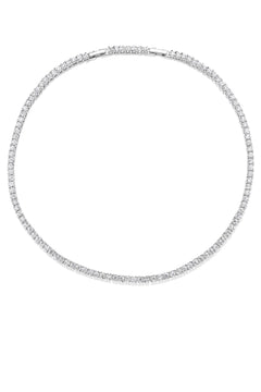 Silver necklace with clear stones on a white background