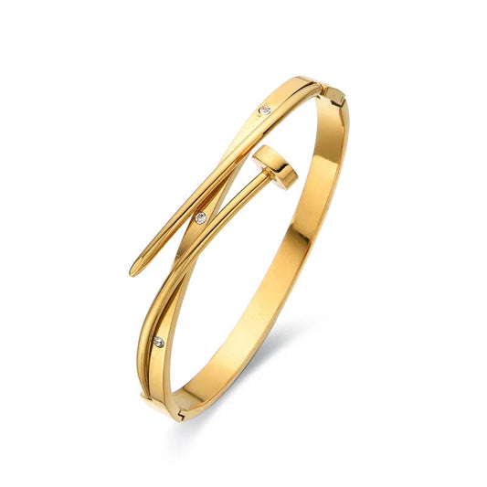 18K gold plated Kelsie Nail Bracelet with CZ stones, hypoallergenic stainless steel, water and tarnish resistant, modern axel nail and eternity design