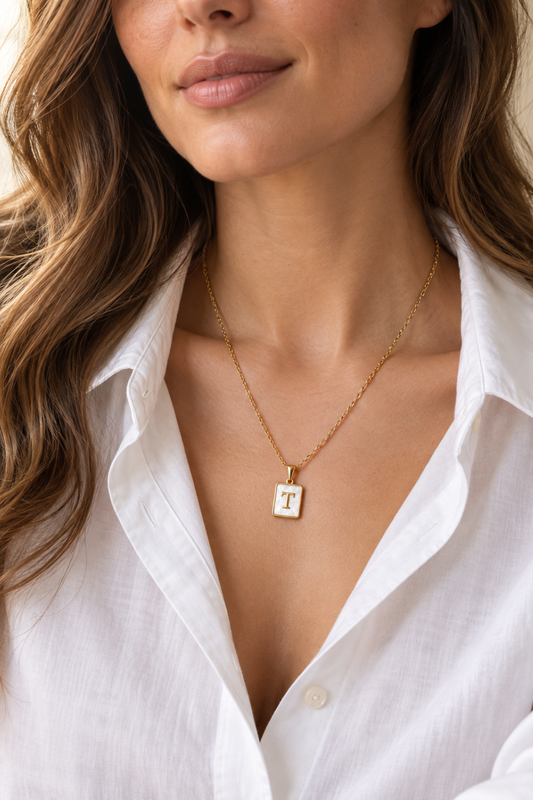 Sahira jewelry Mother of Pearl Initial Cards being sold at rosie karma