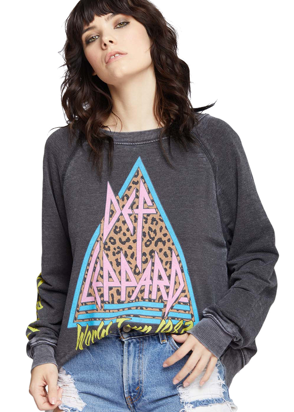 Woman wearing a dark gray sweatshirt with a colorful graphic design on a white background
