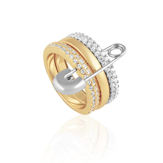 Gold and silver earring with clear gemstones on a white background