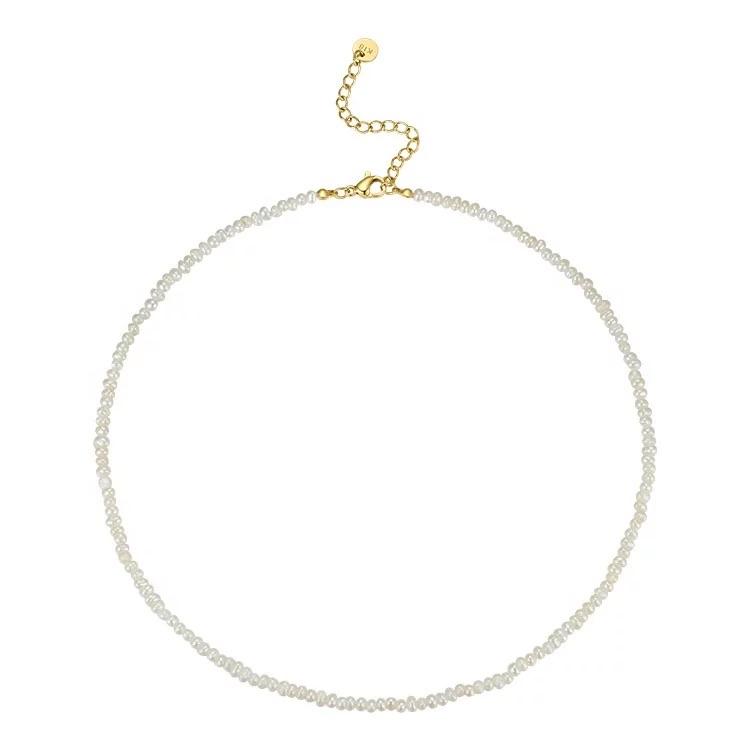 Pearl necklace with gold clasp on a white background