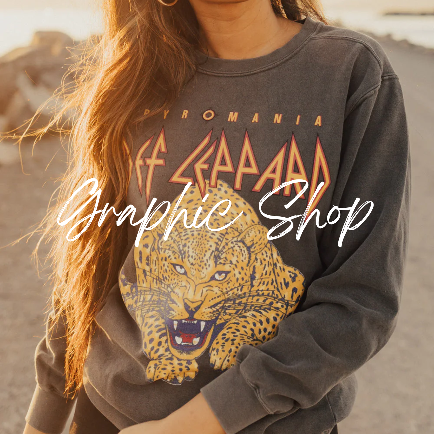 Distressed rock n roll cropped top paired with black high-rise jeans and a black leather jacket– Rosie Karma boutique fashion