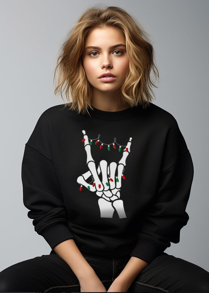 Black sweatshirt with skeleton hand and Christmas lights design on a gray background