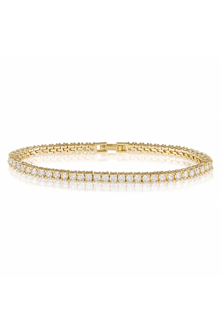 Gold bracelet with cz stones on a white background