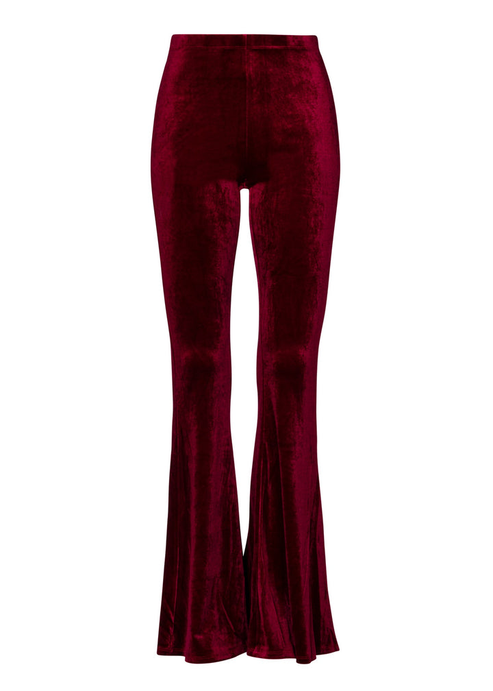 Maroon velvet bell-bottom pants on a white background