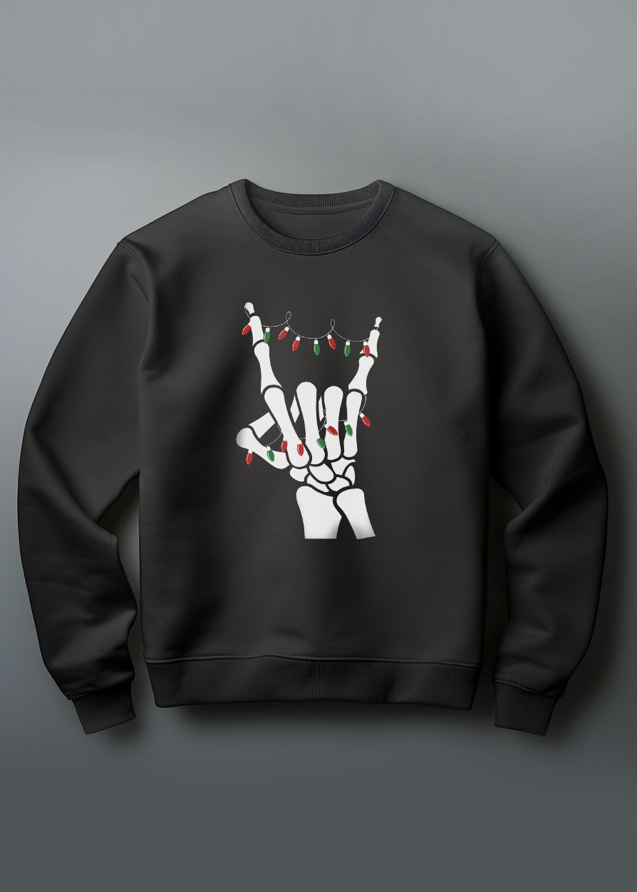 Black sweatshirt with skeleton hand and Christmas lights design on a gray background