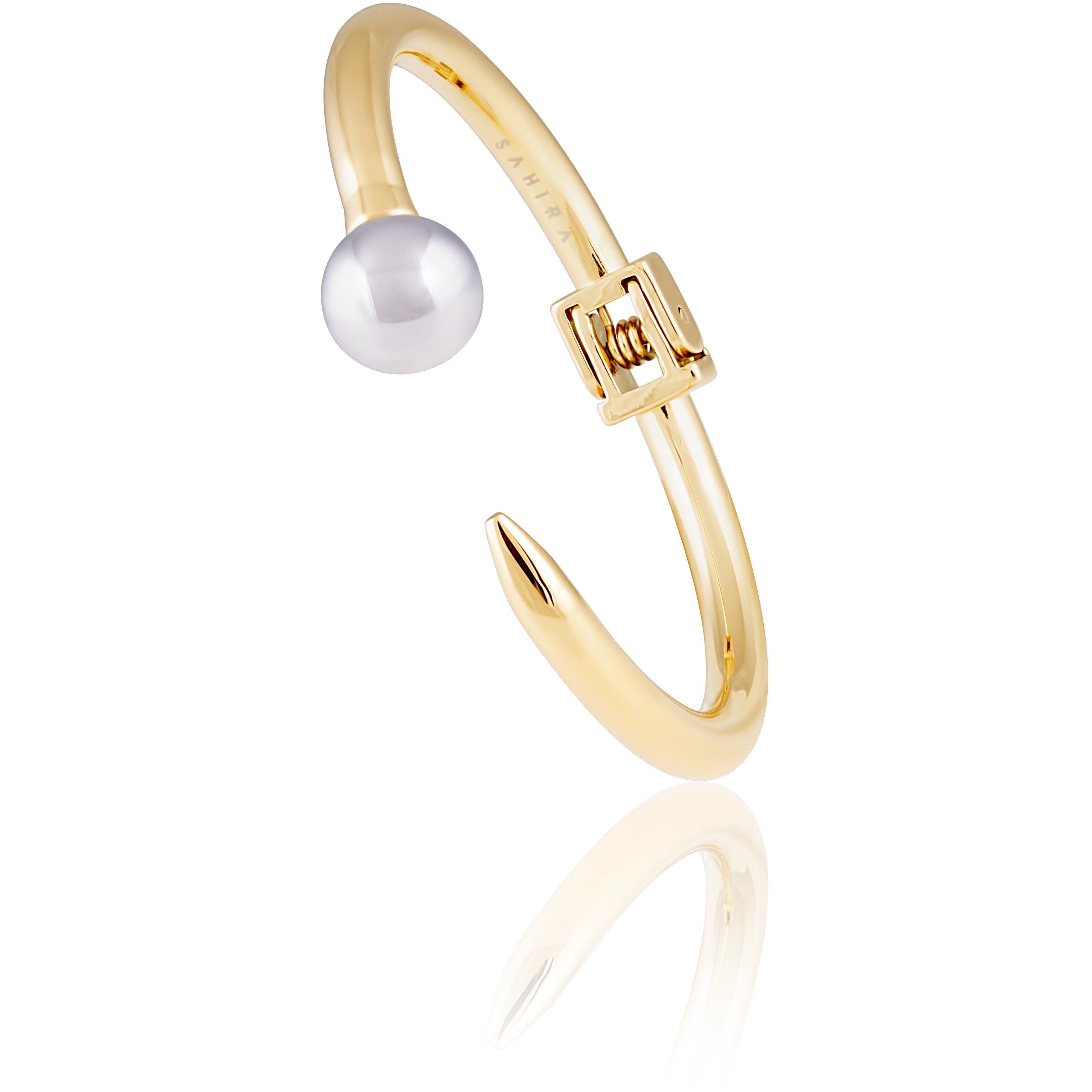 Gold cuff bracelet with ball end