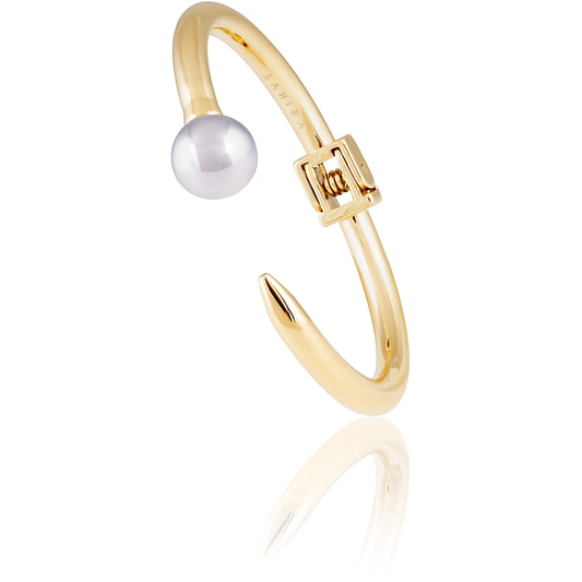 Gold cuff bracelet with ball end