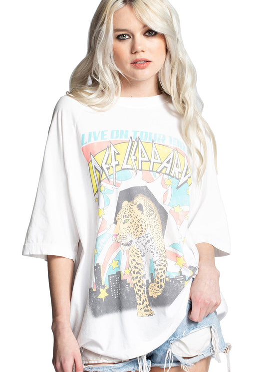 A model wearing a Recycled Karma Def Leppard band tee with "Live On Tour 1987" graphics on the front, celebrating the "Hysteria" album tour.

